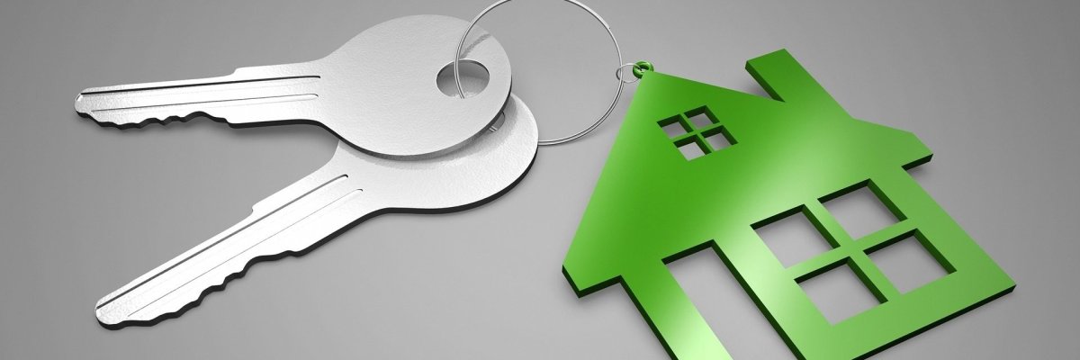 Stockbild von einem Haus und einem Schlüssel